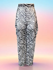 Outstanding Sheer Cover-Up Pants with zebra print, perfect for summer outings and beach days.