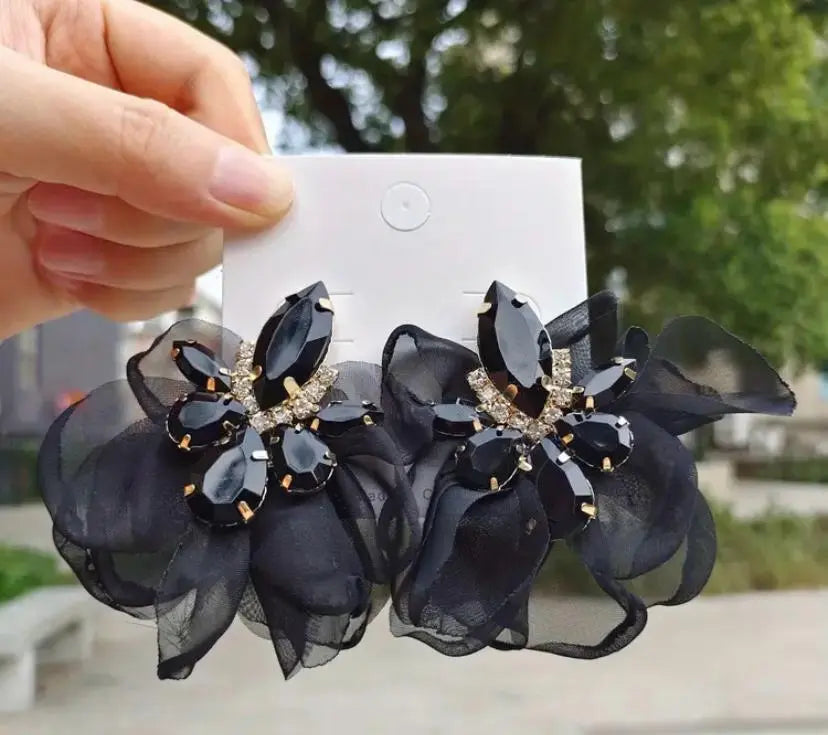 Image & Stylez LLCSheer & Dazzle EarringsSheer & Dazzle EarringsIntroducing the Sheer & Dazzle Earrings, a stunning addition to any jewelry collection. These earrings feature a sheer design that adds a delicate and feminine tAccesaories