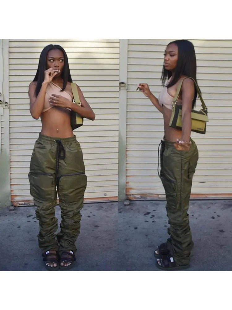 Trendy Selfie Queen Cargo Pants with drawstrings and ruched seams modeled outdoors.