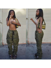 Trendy Selfie Queen Cargo Pants with drawstrings and ruched seams modeled outdoors.
