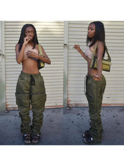 Trendy Selfie Queen Cargo Pants with drawstrings and ruched seams modeled outdoors.