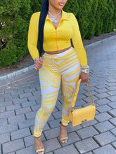 Yellow and white striped women's crop pants set.