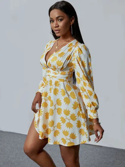 Lovely V-Neck Mini Floral Dress with yellow patterns and long sleeves.
