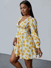 Lovely V-Neck Mini Floral Dress with yellow patterns and long sleeves.