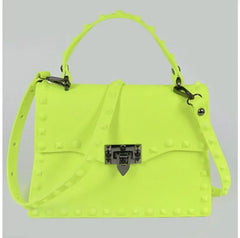 Bright yellow crossbody statement handbag with stud details.