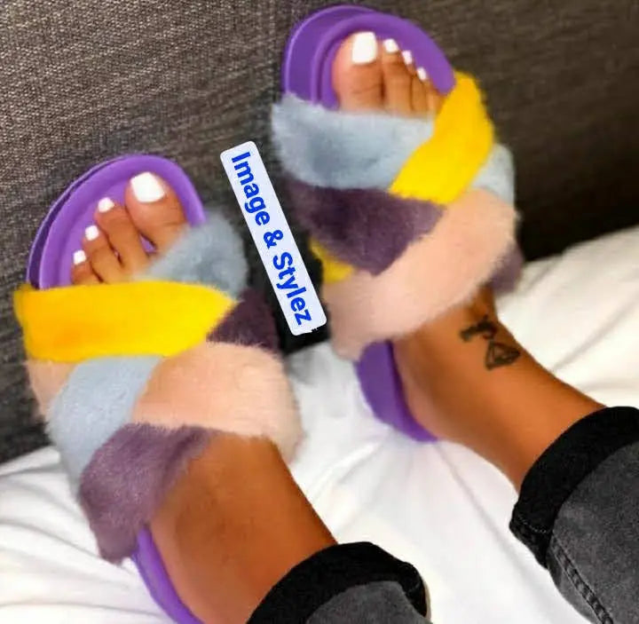 Multi-color faux fur slip-on slides with open toe design.