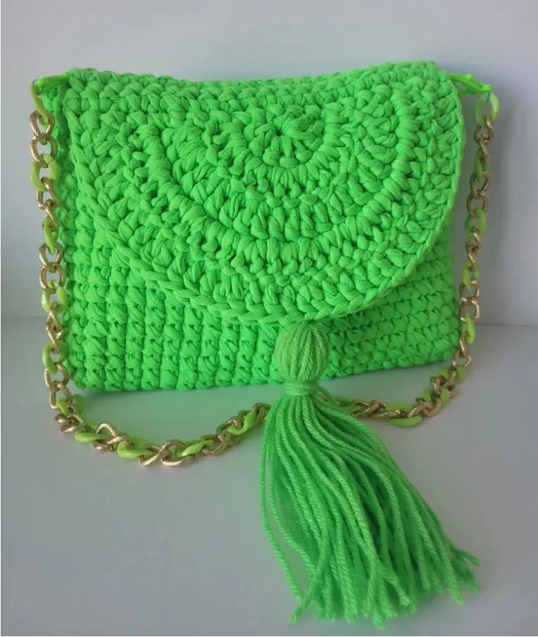 Summer Love Handmade Crochet Handbag with tassel and chain strap in vibrant green.