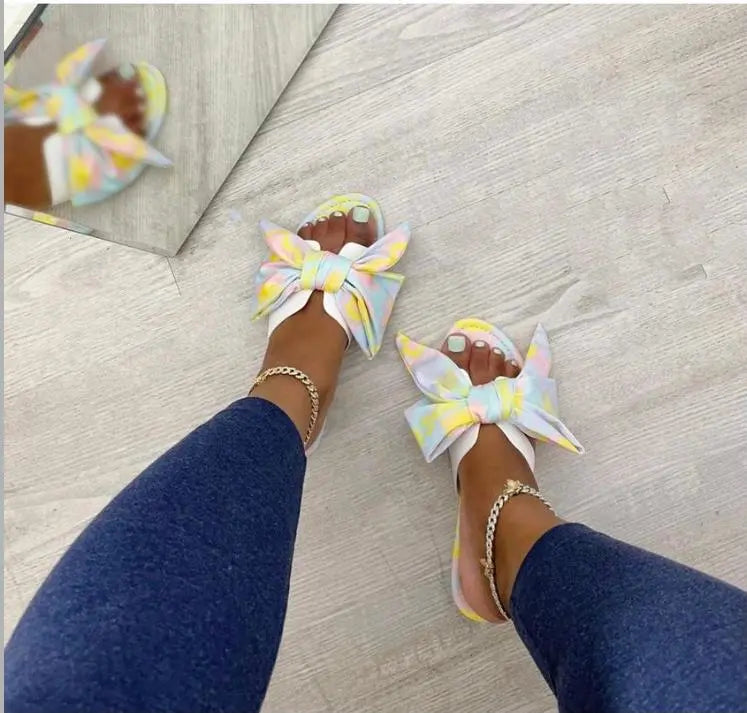Mystique Sandals with bow design for summer fashion.