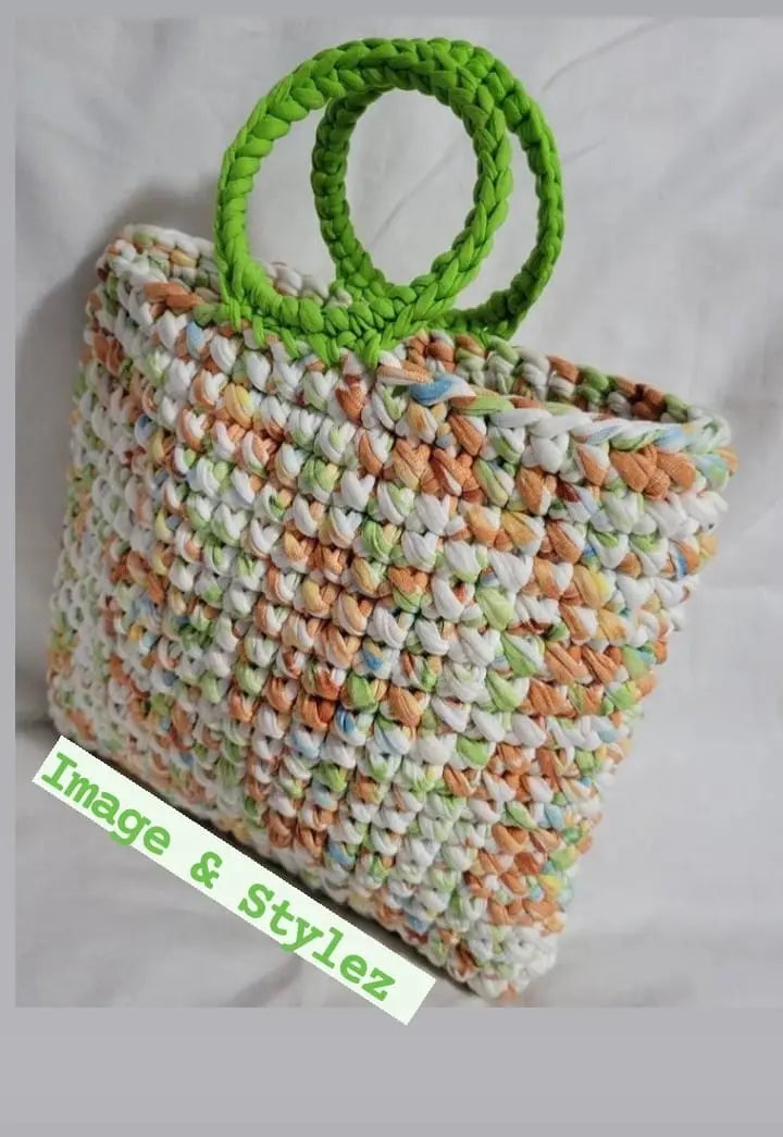 Tropical handmade handbag, chic summer accessory.