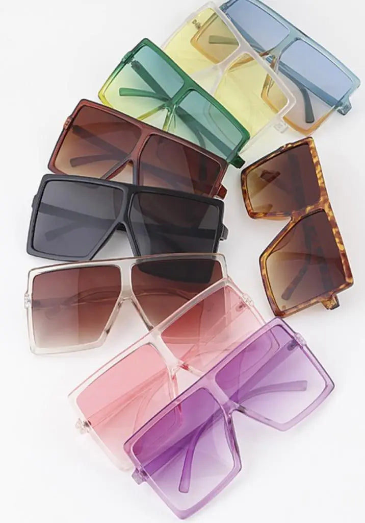 Oversized sunglasses in various colors for everyday and night wear.