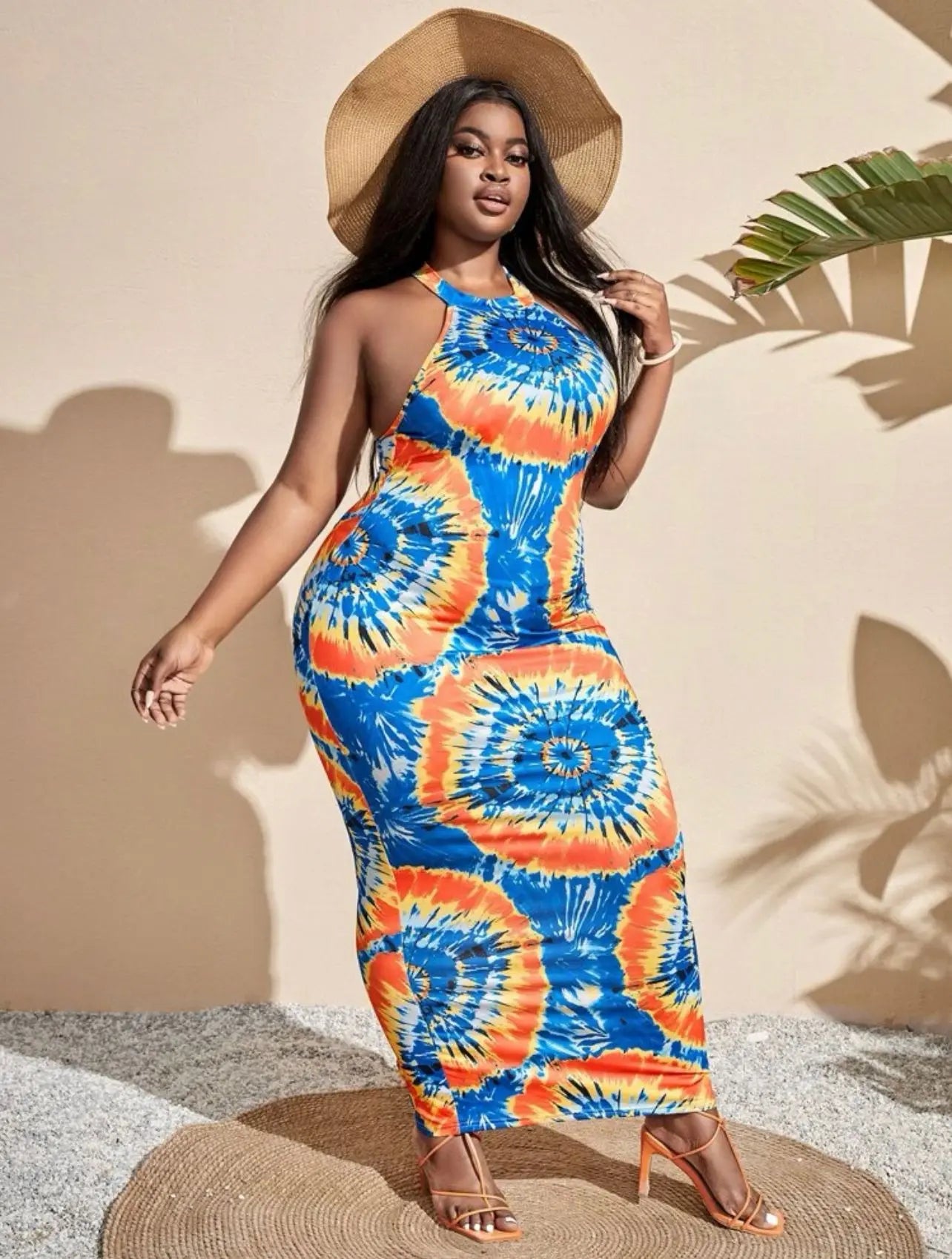 Colorful maxi Getaway Dress with halter neck design and vibrant print.