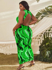 Trendy green maxi-dress with cut-out back design, perfect for vacations and dinner dates.