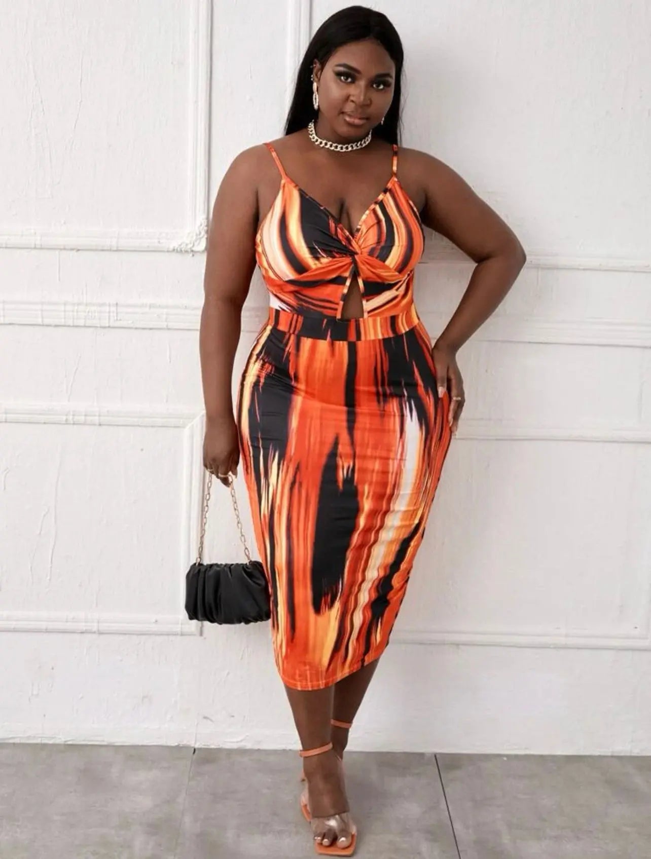 Trendy bright-colored fire dress, chic bodycon style.