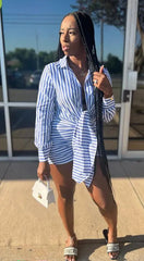 Women's striped button-down dress with sash, perfect for brunch or dinner.