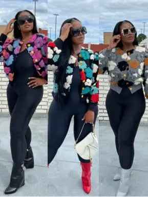 Trendy plush floral print cardigan sweater with long sleeves and button-down style.