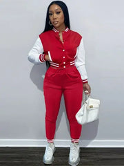 Women's trendy red tracksuit pants set with white accents.
