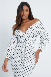 Womens Polka Dot Wrap Bodycon Dress with long sleeves and V-neckline.