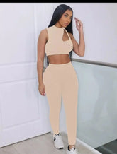 Womens sexy leggings set with mock neck sleeveless crop top.
