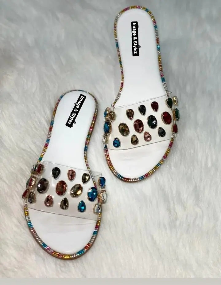 Simply Dazzling Sandals with rhinestone embellishments on a soft slip-on design.