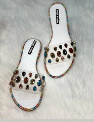 Simply Dazzling Sandals with rhinestone embellishments on a soft slip-on design.