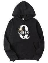 Stylish black royal hoodie with queen crown design, cozy fleece lining.