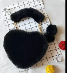 Image & Stylez LLCLove Fuzzy Heart HandbagColor My Love Fuzzy Heart HandbagThis stylish plush handbag is designed with fluffy fur outside. It has a fuzzy top handle and one golden chain shoulder strap that is removable. There are 3 differen