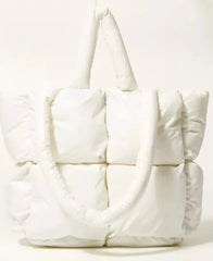 Image & Stylez LLCFun & Futuristic Puffy HandbagFun & Futuristic Puffy HandbagThis chic and stylish handbag is designed in puffed fabric for a futuristic look you’ll love. Each bag comes with double sized handles for a versatile and comfortablHandbags