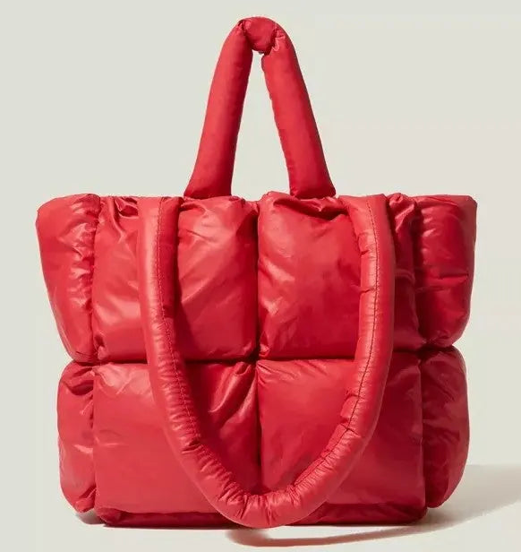 Image & Stylez LLCFun & Futuristic Puffy HandbagFun & Futuristic Puffy HandbagThis chic and stylish handbag is designed in puffed fabric for a futuristic look you’ll love. Each bag comes with double sized handles for a versatile and comfortablHandbags