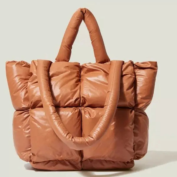 Image & Stylez LLCFun & Futuristic Puffy HandbagFun & Futuristic Puffy HandbagThis chic and stylish handbag is designed in puffed fabric for a futuristic look you’ll love. Each bag comes with double sized handles for a versatile and comfortablHandbags