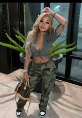 Women wearing camo cargo pants standing outdoors.