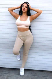 Women's high rise cotton legging in tan, size L.