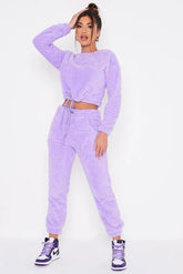 Cozy drawstring jogger set in soft purple fabric with trendy design.