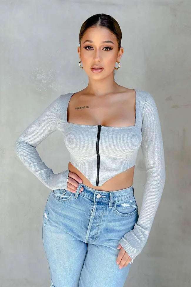 Image & Stylez LLCRibbed ZipToo Hot For You Ribbed Zip Up TopThis ribbed zip up top offers a sleek and stylish addition to any wardrobe. Its lightweight and breathable fabric provides comfort, while the ribbed design adds textTights