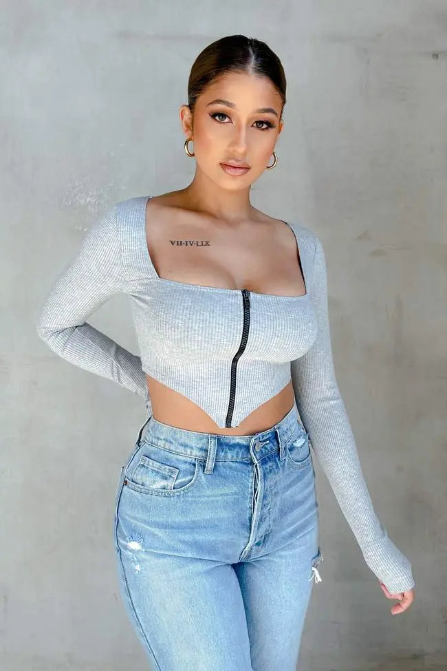 Image & Stylez LLCRibbed ZipToo Hot For You Ribbed Zip Up TopThis ribbed zip up top offers a sleek and stylish addition to any wardrobe. Its lightweight and breathable fabric provides comfort, while the ribbed design adds textTights