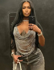 Woman wearing stylish Fashion Body Jewelry and taking a mirror selfie.