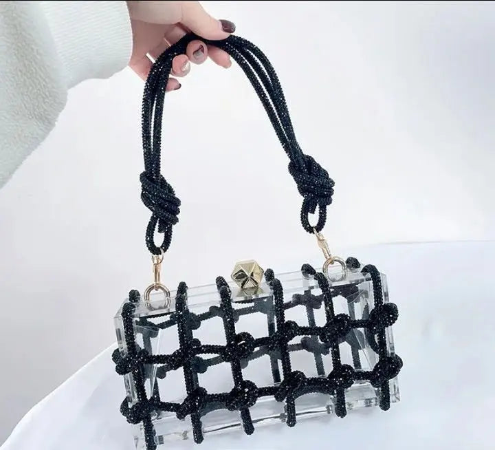 Image & Stylez LLCGlamorous Rhinestone Clucth HandbagGlamorous Rhinestone Clucth HandbagLooking to add a touch of glamour to your wardrobe? Look no further than our Glamorous Rhinestones Clutch Handbag!
Crafted from high-quality acrylic, this clutch boaAccessories
