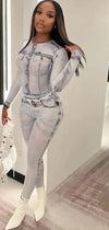 Woman wearing trendy denim print tights set with a stylish fit.