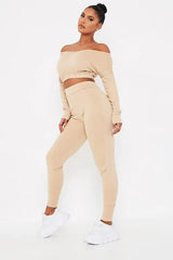 Long sleeve V-neck lounge set in beige, trendy and comfy design.